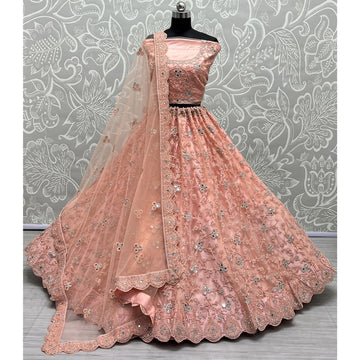 Net Fabric Bridal Lehenga Choli With Embroidery Work In Pink Color