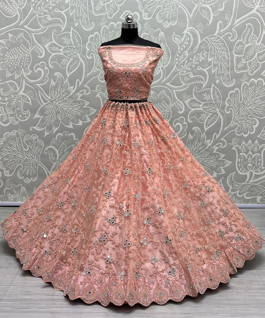 Net Fabric Bridal Lehenga Choli With Embroidery Work In Pink Color