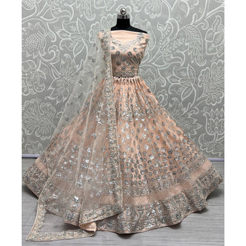 Net Fabric Bridal Lehenga Choli With Embroidery Work In Off Pink Color