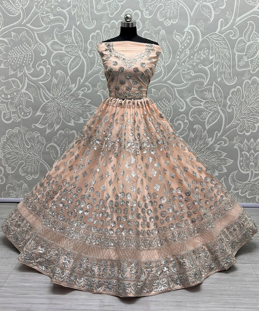 Net Fabric Bridal Lehenga Choli With Embroidery Work In Off Pink Color
