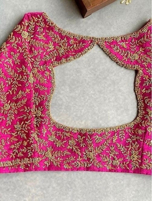pink hand embroidered blouse