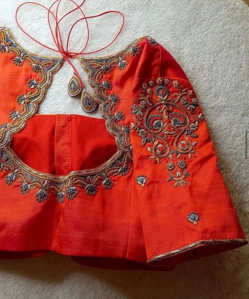 orange saree maggam blouse