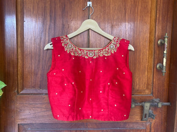 Red sleeveless hand embroidery blouse