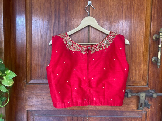 Red sleeveless hand embroidery blouse