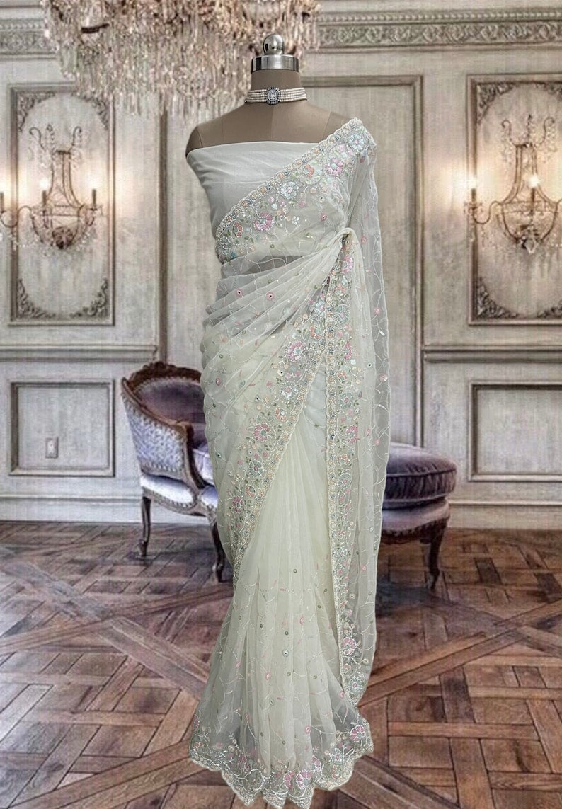 Beautiful cream white color soft organza saree