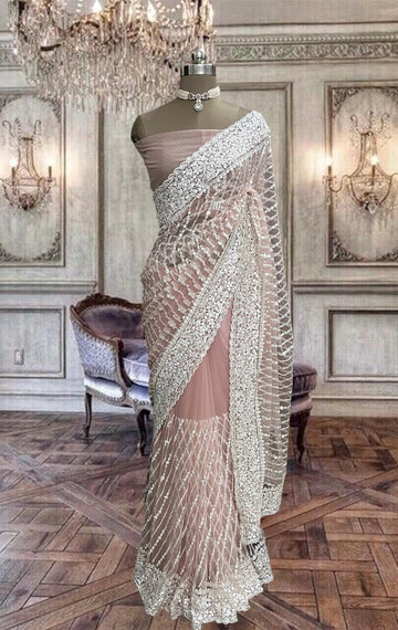 Beautiful peach colored net saree