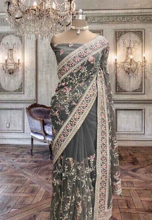 Beautiful dark grey net saree with stones and colorful threads