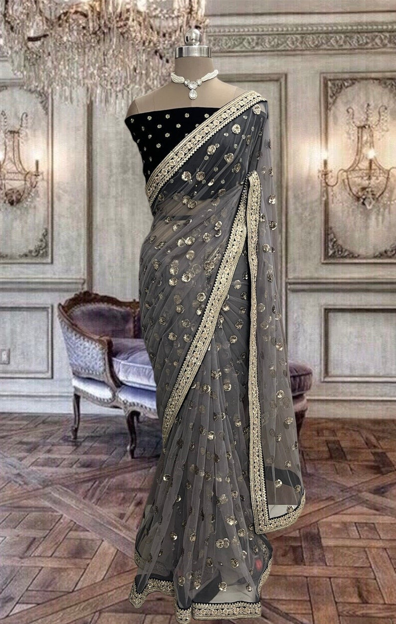 Beautiful grey colored net saree with sequins work
