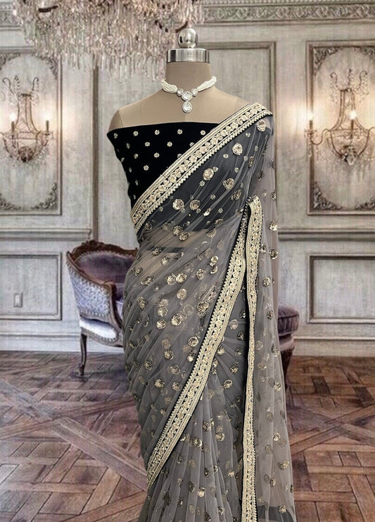 Beautiful grey colored net saree with sequins work