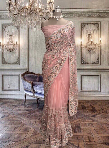 Beautiful peach- pink net saree with colourful thread work